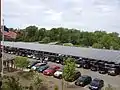 Solar panel canopies over parking lots
