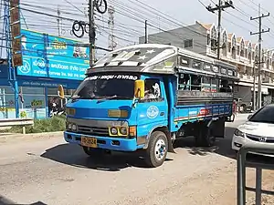 Image 160Medium-sized Isuzu Songthaew (truck bus) as seen in Samut Sakhon, Thailand. (from Combination bus)