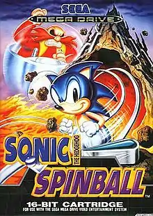 The game's North American cover art. The artwork shows Sonic the Hedgehog running in the foreground, while series antagonist Doctor Robotnik is angrily chasing him on a floating pod. The background shows the volcanic Mt Mobius erupting. Pinball flippers can be seen at the bottom.