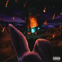 A flaming, wrecked UFO in a desert at night. In the foreground, the head and ears of a pink rabbit are illuminated by the fire.