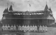 South End Grounds (1888), grandstand in background