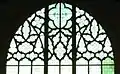 South window tracery shows Art Nouveau influence