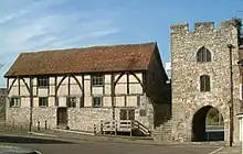 The Tudor Merchants Hall (l) and the West Gate (r)