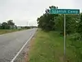 Spanish Camp sign is along FM 1161 going southeast toward the FM 640 intersection.