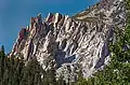 Spires on the northeast aspect of Kettle Peak. Unofficial names include "Outguard Spire", "The Turret", "Regge Pole", and "The Duck".