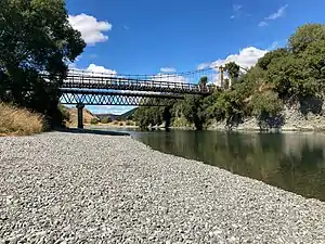 Suspension Bridge in the foreground, modern bridge behind