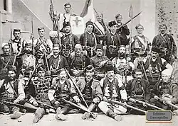 Group photo, taken during the Young Turk Revolution (1908). Krsta standing third in the second row (from the top), in dark attire.