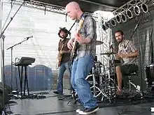 Straylight Run performing in 2009. Left to right: John Nolan, Shaun Cooper, and Will Noon.