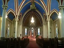 Church with high vaulted ceiling supported by columns