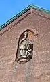 Bronze Statue of Saint Francis Xavier installed on the niche of the front gable.