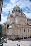 A white church with a dome.