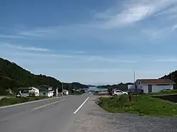 Main Street in St. Lunaire-Griquet, with White Cape Harbour in the distance