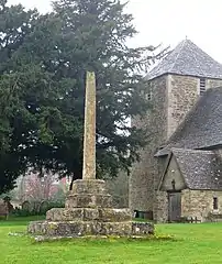 A broken cross in the churchyard of St Lawrence's Church, North Hinksey