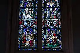 The southern Endean Memorial Window, by James Powell and Sons a.k.a. Whitefriars Glass, in the Requiem Chapel, depicting the Baptism of Jesus, Adoration of the Shepherds, Crucifixion of Jesus and Flight into Egypt, 1959.