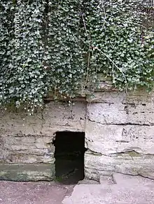 Saint Robert's Cave, also called Saint Roberts Chapel, about 120m South West of Grimbald Bridge