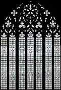 Decorated window (c.1917) at the west end of the nave.
