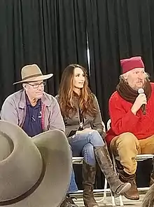 Stacy Lyn Harris participating in the Q&A panel at the 2018 Homesteader's of America Conference with Joel Salatin and Eustace Conway.