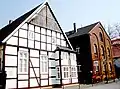Half-timbered house, built about 1750, brick building, built in 1874
