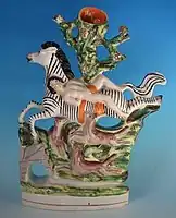 Ride of Mazeppa, based on Lord Byron's poem of 1818. Depicting the horse as a zebra is a flight of fancy. Spill vase, c. 1860.