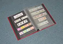 A stockbook with clear plastic pockets is one of the safest ways to store stamps. Some collectors prefer a traditional stamp album.