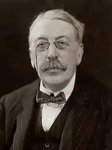 Charles Villiers Stanford, Irish composer.