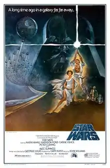 Film poster showing Luke Skywalker heroically holding a lightsaber in the air, Princess Leia kneeling beside him, and R2-D2 and C-3PO behind them. A figure of the head of Darth Vader and the Death Star with several starfighters heading towards it are shown in the background. Atop the image is the tagline "A long time ago in a galaxy far, far away..." On the bottom right is the film's logo, and the credits and the production details below that.