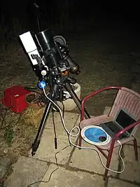 Image 10An amateur astrophotography setup with an automated guide system connected to a laptop. (from Observational astronomy)