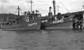 Two ships of the Royal Australian Corps of Transport at Port Moresby