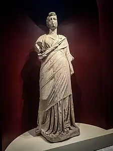 Statue of a woman with hairstyle dating to the later Roman Republican or Augustan period but body dating to 200–100 BCE