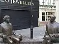 Statues of Oscar Wilde and Eduard Vilde in Galway. The original of this sculpture is located in Tartu.