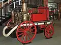 British horse-drawn fire engine with steam-powered water pump