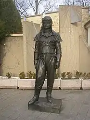 Statue of Milan Rastislav Štefánik in front of sundial