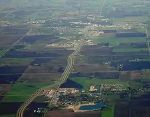 Blumenort (located in the lower portion) as seen from the air with Steinbach (upper) seen to the southern part of the picture.