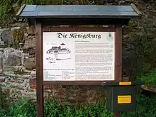 Information board by the castle ruins with checkpoint 41 of the Harzer Wandernadel: Ruine Königsburg