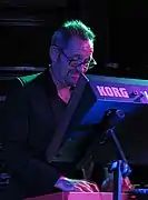 A man playing keyboards