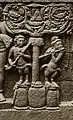 9th century C.E. Stick zither with bird at bottom and flute played by kinnaras,  Borobudur hidden base.