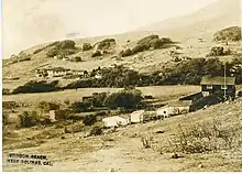 1916 photo postcard of Stinson Beach, showing Airey's Hotel to the left