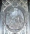 One of the reliefs on the door of the Palais Equitable illustrating the legend of the Stock im Eisen