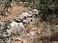 Reused stones that form a wall at Chezib (Achzib) of Judah