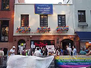 The Stonewall Inn in Greenwich Village, a designated U.S. National Historic Landmark and National Monument, as the site of the June 1969 Stonewall riots and the cradle of the modern gay rights movement