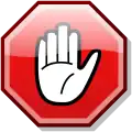 An icon of a stop sign with a hand at the middle.