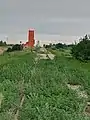 Both of Stoughton's grain elevators alongside the railway