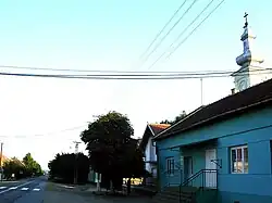 The main street and the Romanian Orthodox church