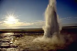 The eruption of the geysir Strokkur in early morning.