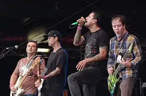 Strung Out live in 2013. From left to right: Rob Ramos, Chris Aiken, Jason Cruz and Jake Kiley.