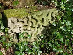 A vermiculate stone from the ornate Walled Garden bridge.