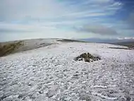 Looking along the summit ridge, from the cairn on the south top. The north top is on the skyline