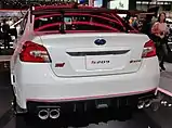 Rear view of the Subaru WRX STI S209, a high-performance variant of the Subaru WRX STI. This model was marketed exclusively in the United States. This particular image shows a white car with a small "S209" badge on the rear trunk lid.