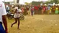 Female athlete during mt Cameroon race of hope at few meter to the finish line