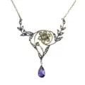 An Art Nouveau era Suffragette necklace with amethyst, pearl, and peridot set in 9K gold.